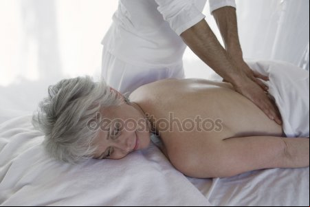 depositphotos woman receiving back massage